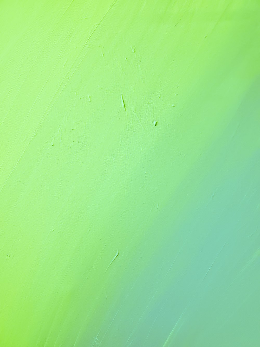 grün gestrichene Wand mit Loch