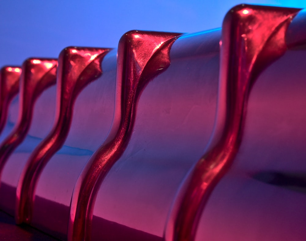 red metal bar in close up photography
