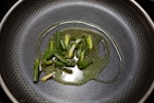 green vegetable on stainless steel round plate