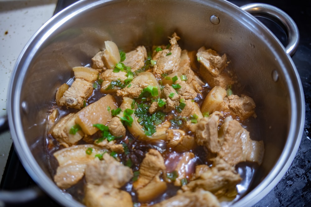 cooked food in stainless steel cooking pot