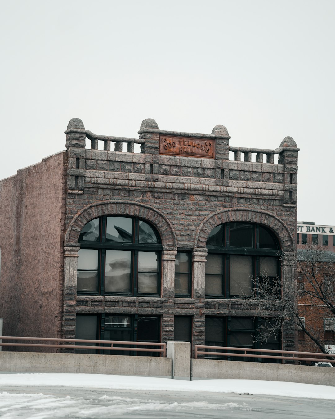 brown concrete building under white sky during daytime