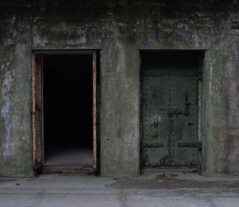 brown wooden door on gray concrete wall