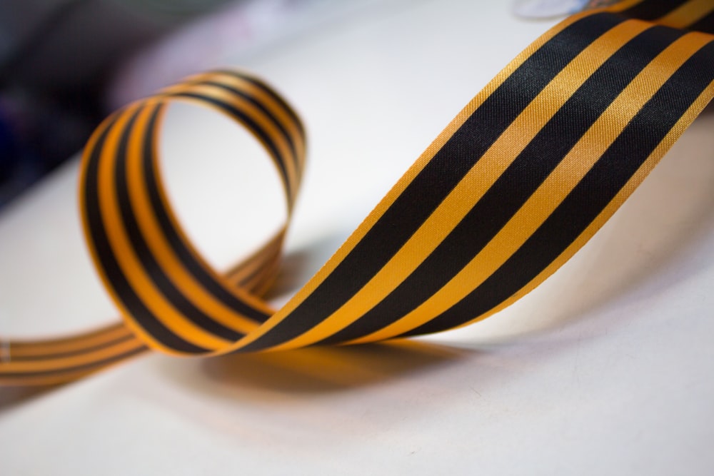 black and yellow striped ribbon