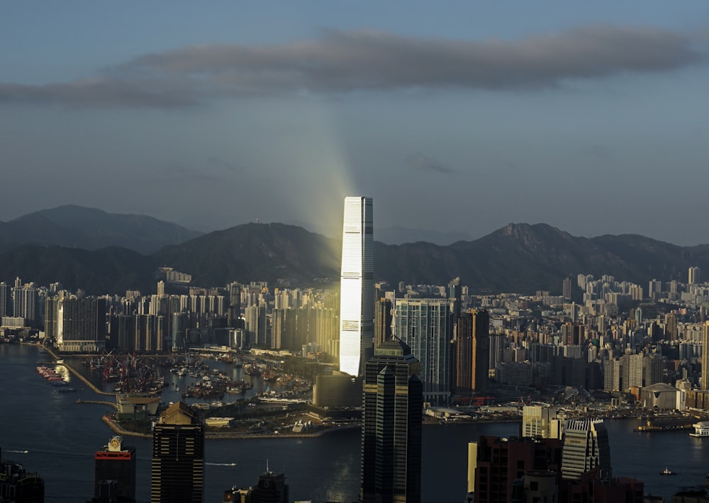 high rise buildings near body of water during daytime