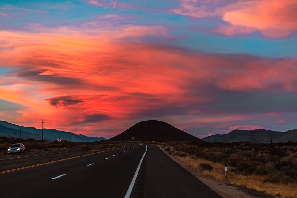 gray asphalt road during sunset