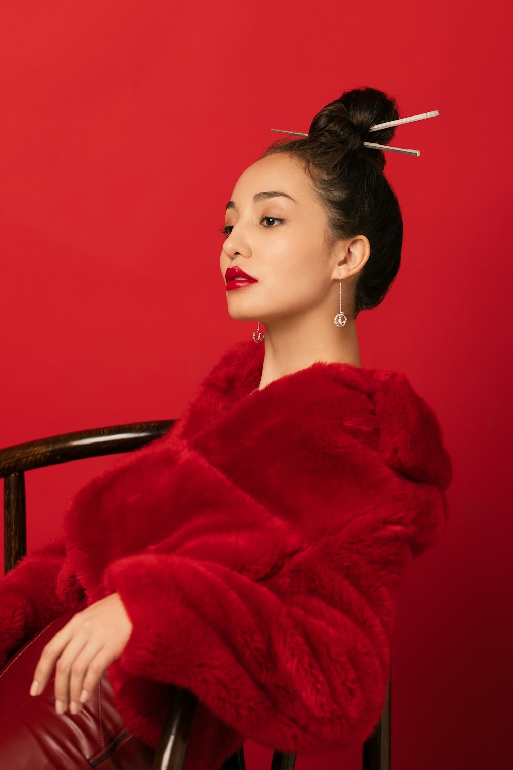 woman in red fur coat