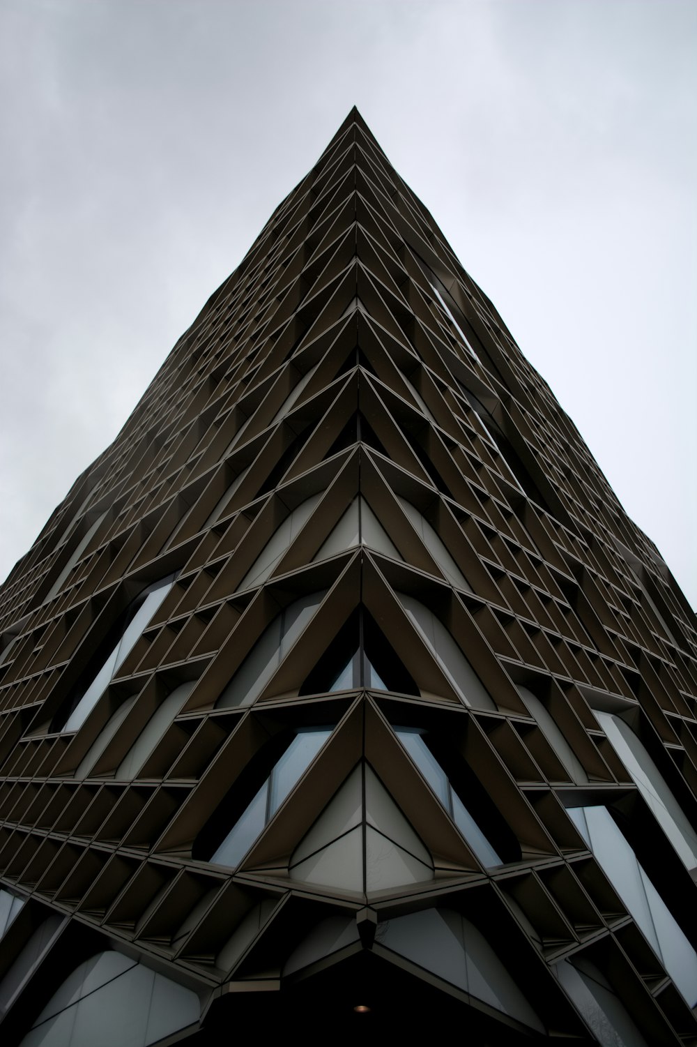 brown concrete building under white sky during daytime