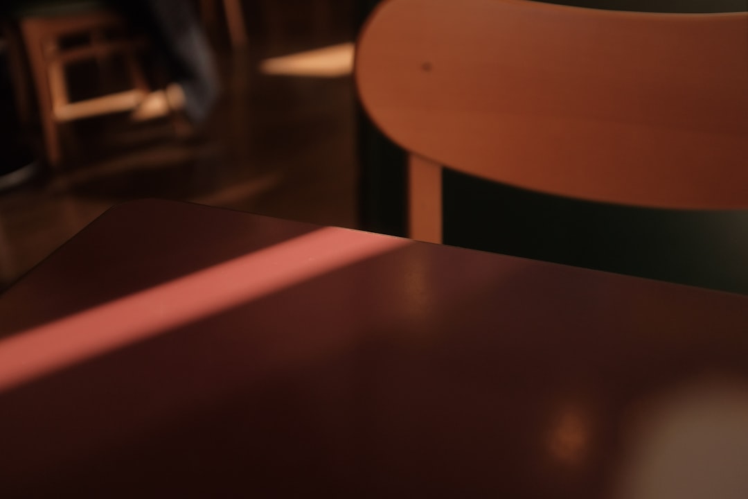 brown wooden table with chairs