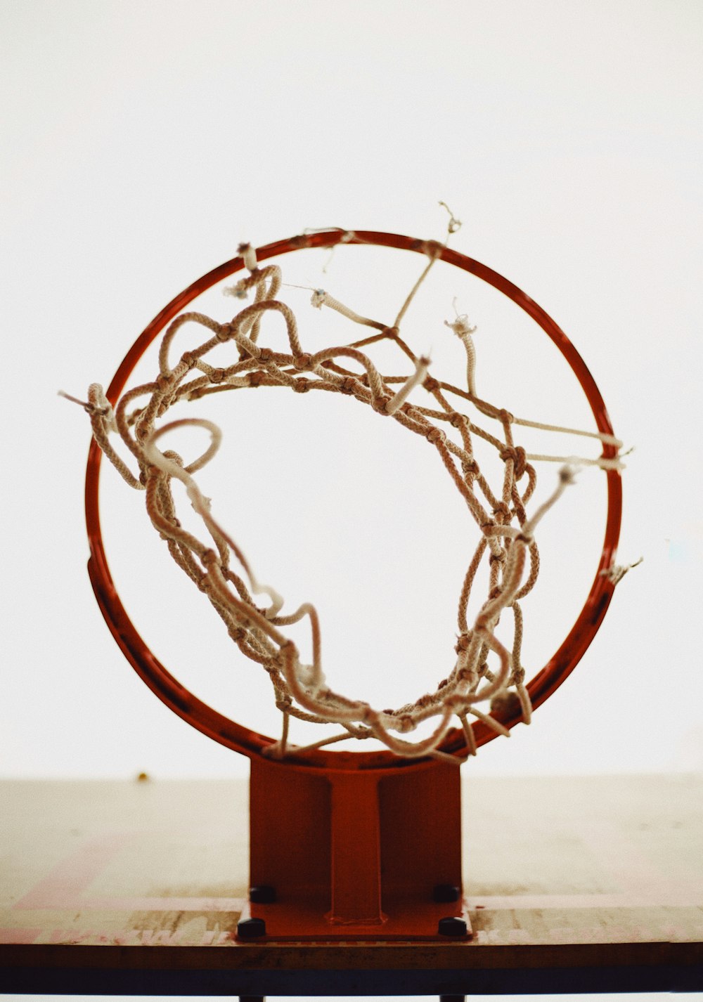 brown and white basketball hoop