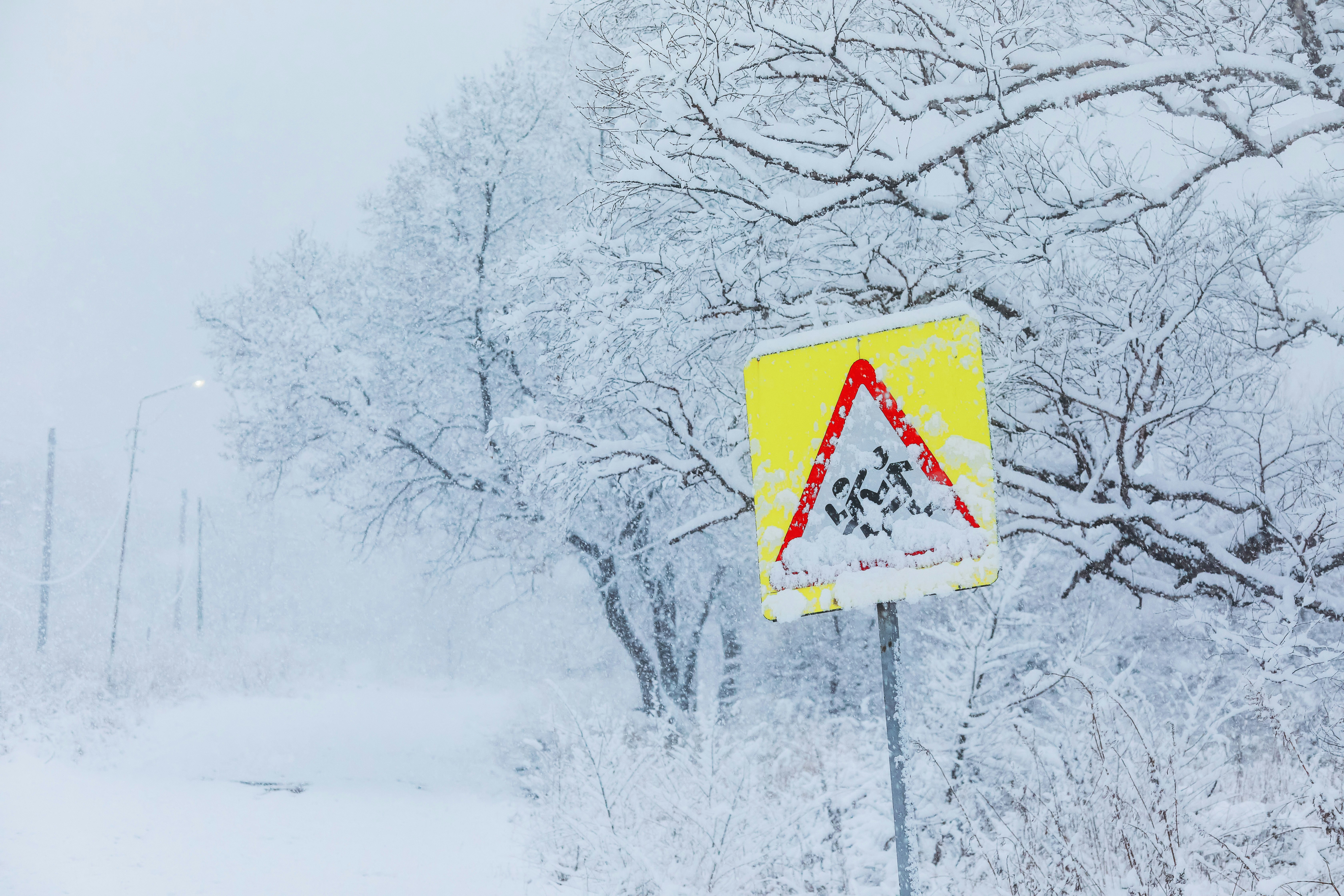 red and white arrow sign