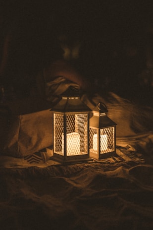 black and white lamp on brown textile