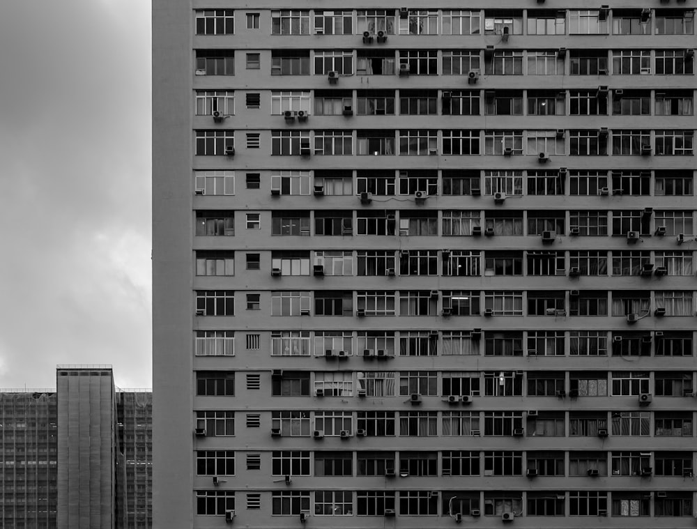 grayscale photo of high rise building