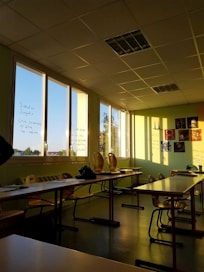 black rolling chair near brown wooden table