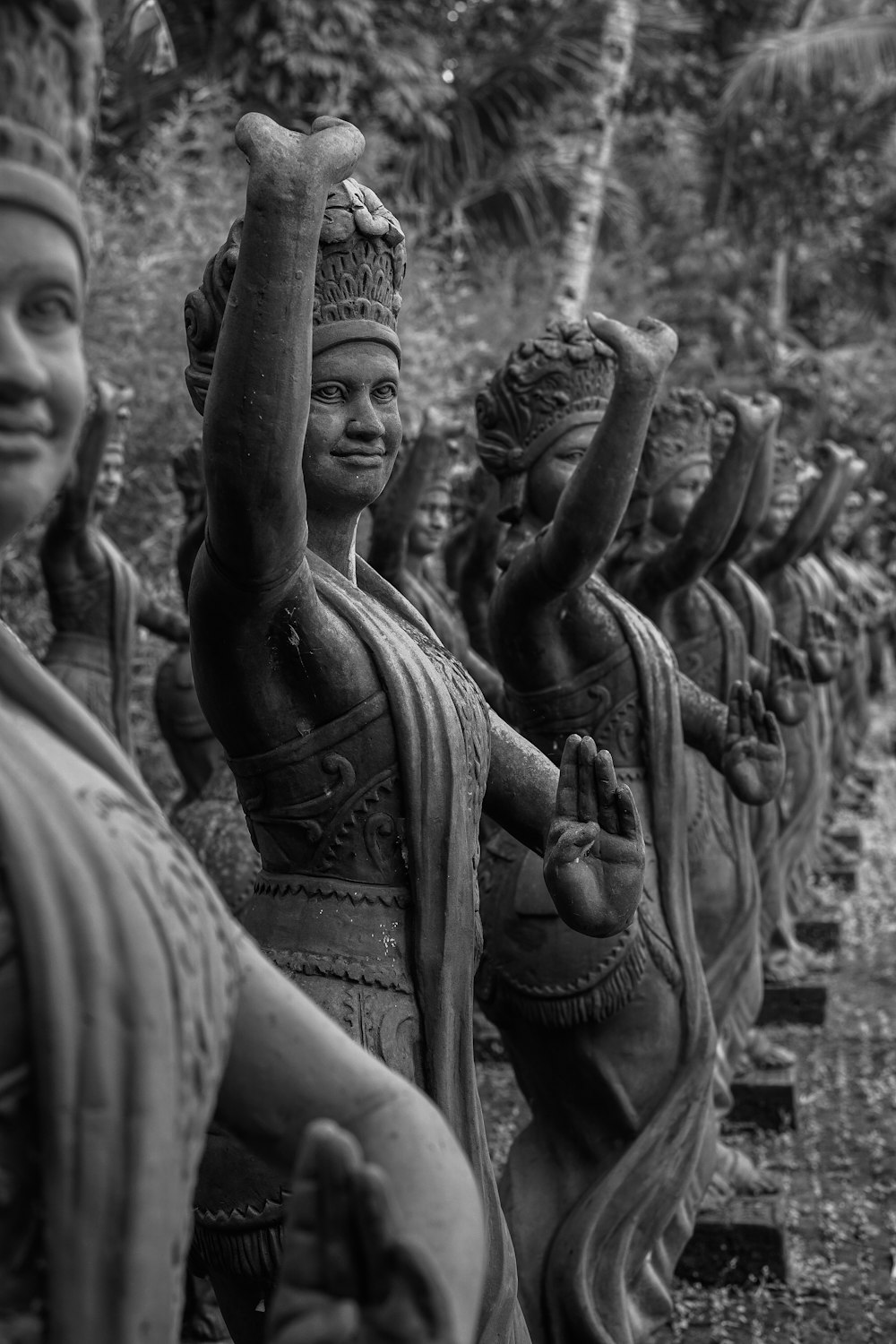 grayscale photo of people statues