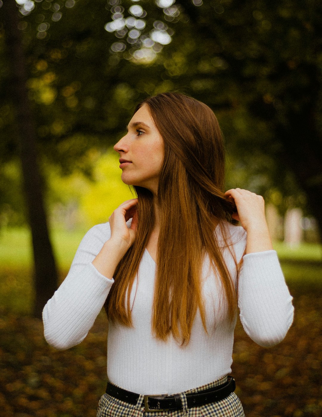 woman in white long sleeve shirt