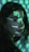 A person is seen with bright green digital symbols projected onto their face and hair. The symbols resemble characters from a computer screen, giving a futuristic or cybernetic appearance against the dimly lit background. The person has long dark hair and is looking sideways.