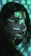 A person is seen with bright green digital symbols projected onto their face and hair. The symbols resemble characters from a computer screen, giving a futuristic or cybernetic appearance against the dimly lit background. The person has long dark hair and is looking sideways.