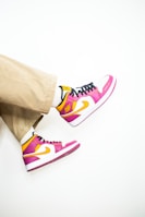 Close-up of colorful sneakers paired with casual outfits.