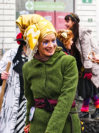 A group of diverse people joyfully wearing Noupess clothes, celebrating life and culture together.