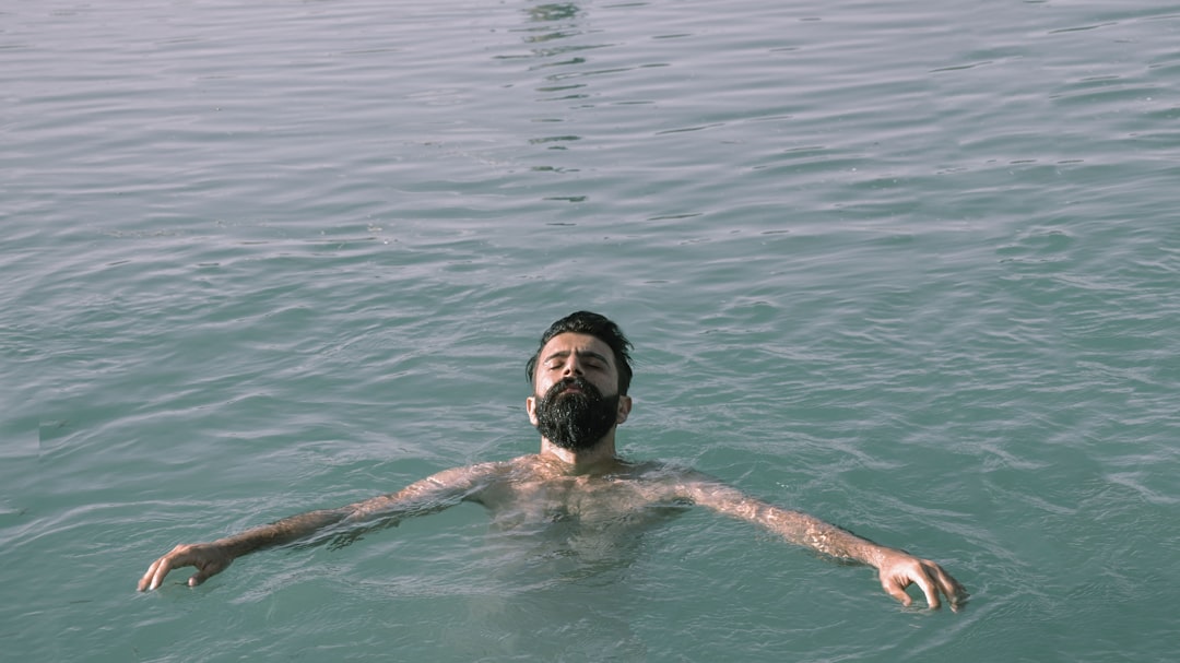 man in water during daytime
