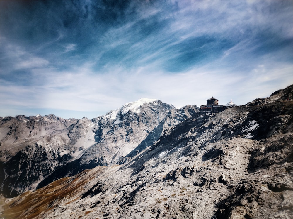 gray rocky mountain under blue sky during daytime