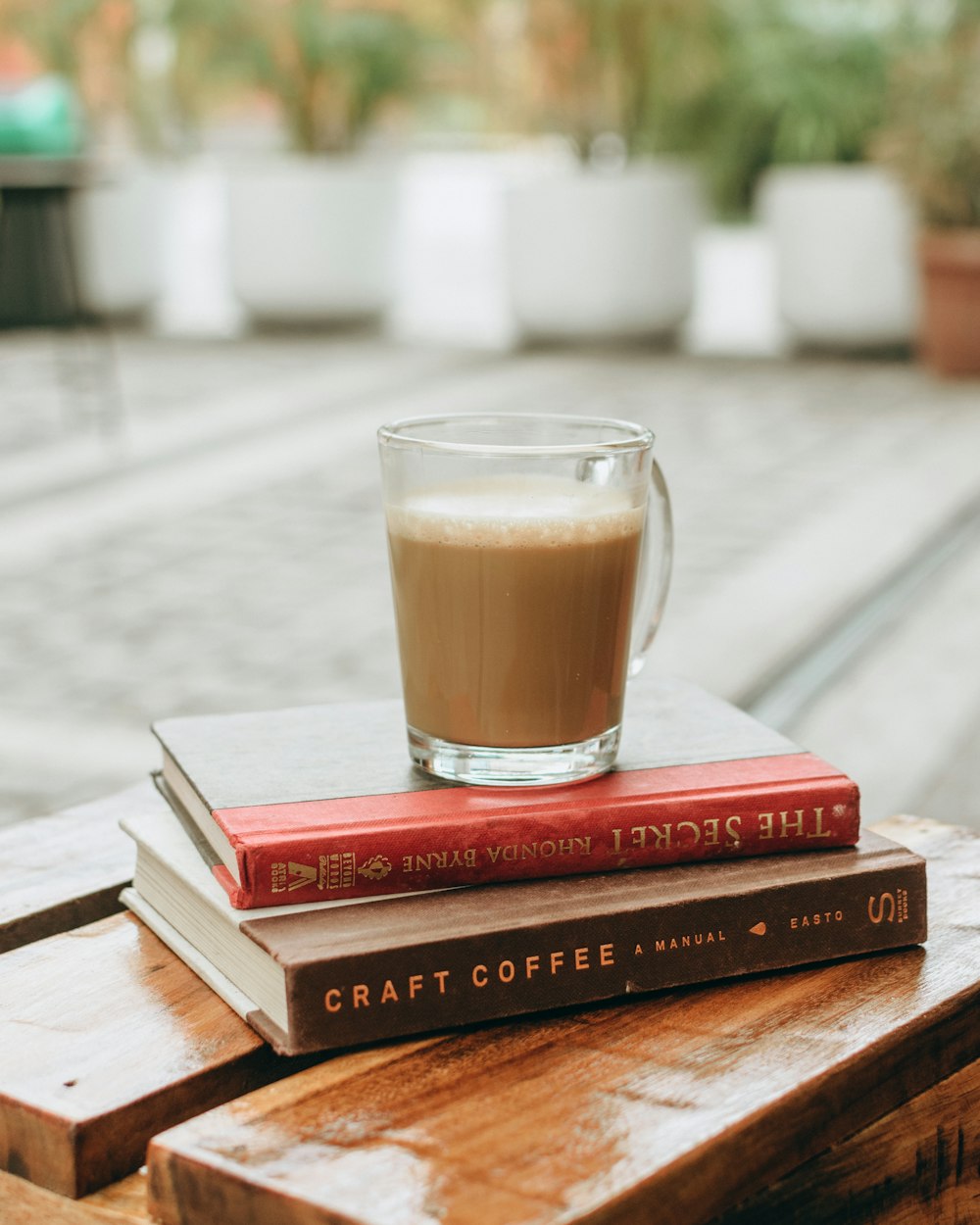 red book on brown wooden table