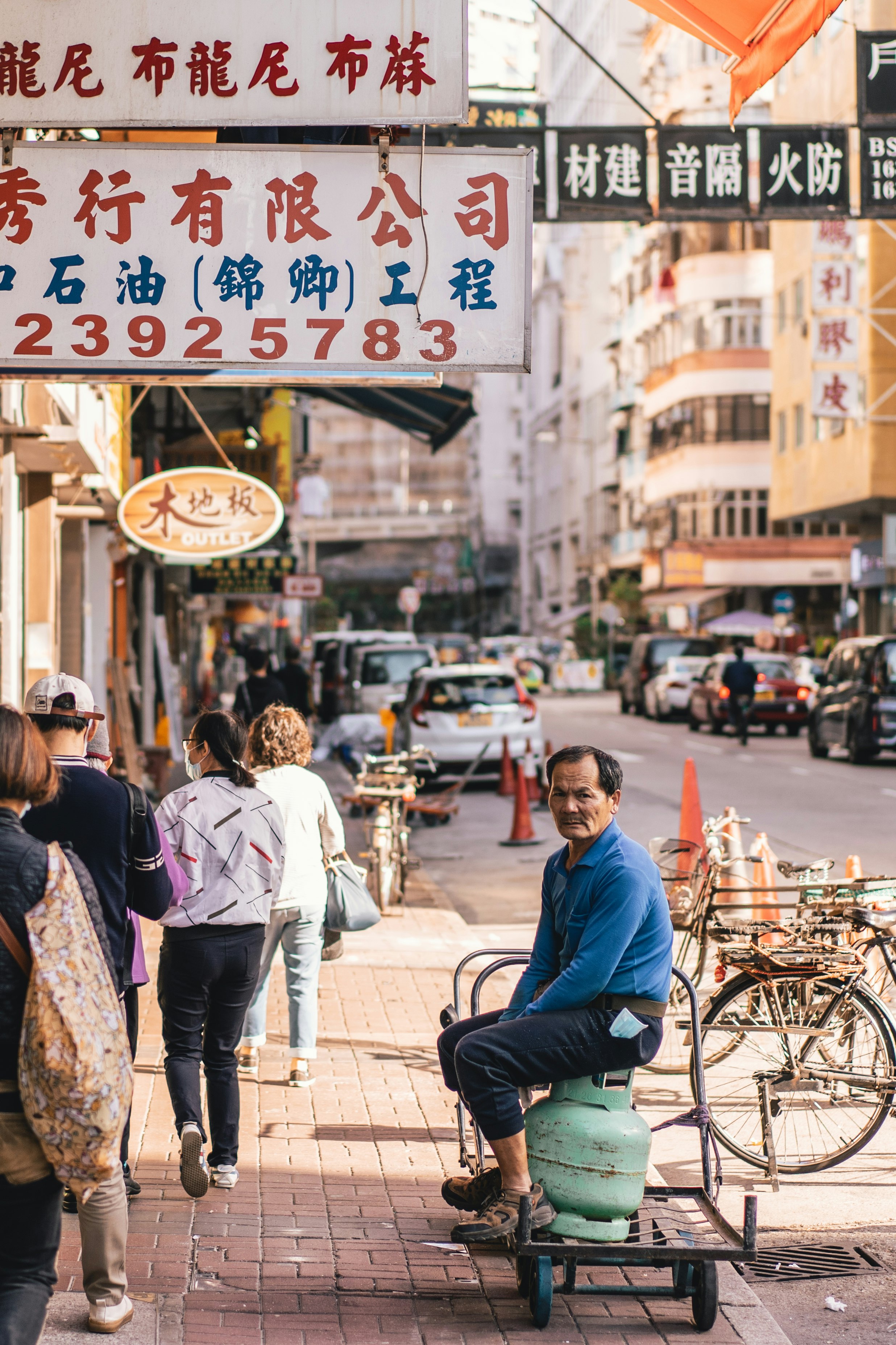 people walking on sidewalk during daytime