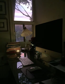 An elegant, minimalist workspace illuminated by a gentle, moonlit glow perfect for focused moments.