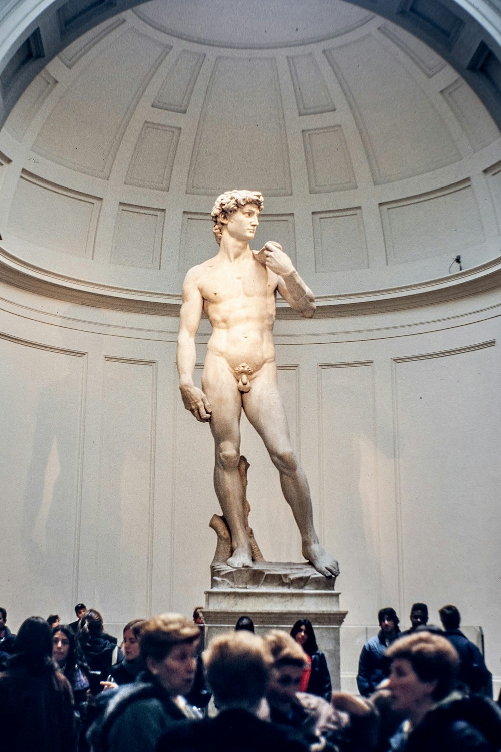 man statue in white room