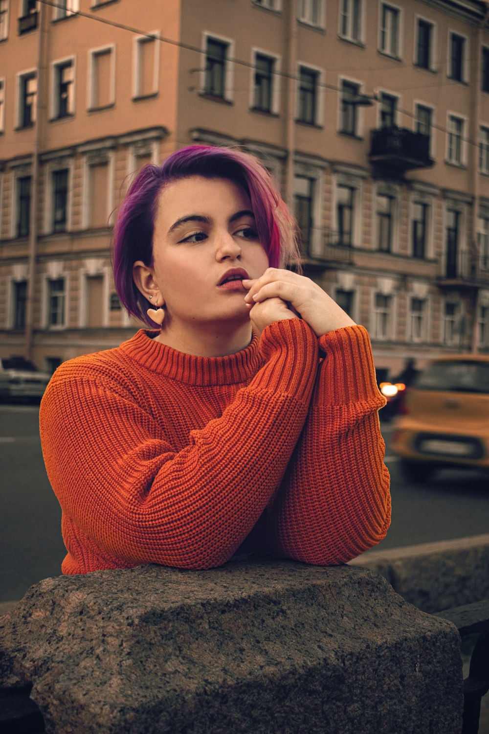 woman in red knit sweater