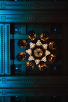 Intricate wooden ceiling design with integrated lighting highlighting craftsmanship.