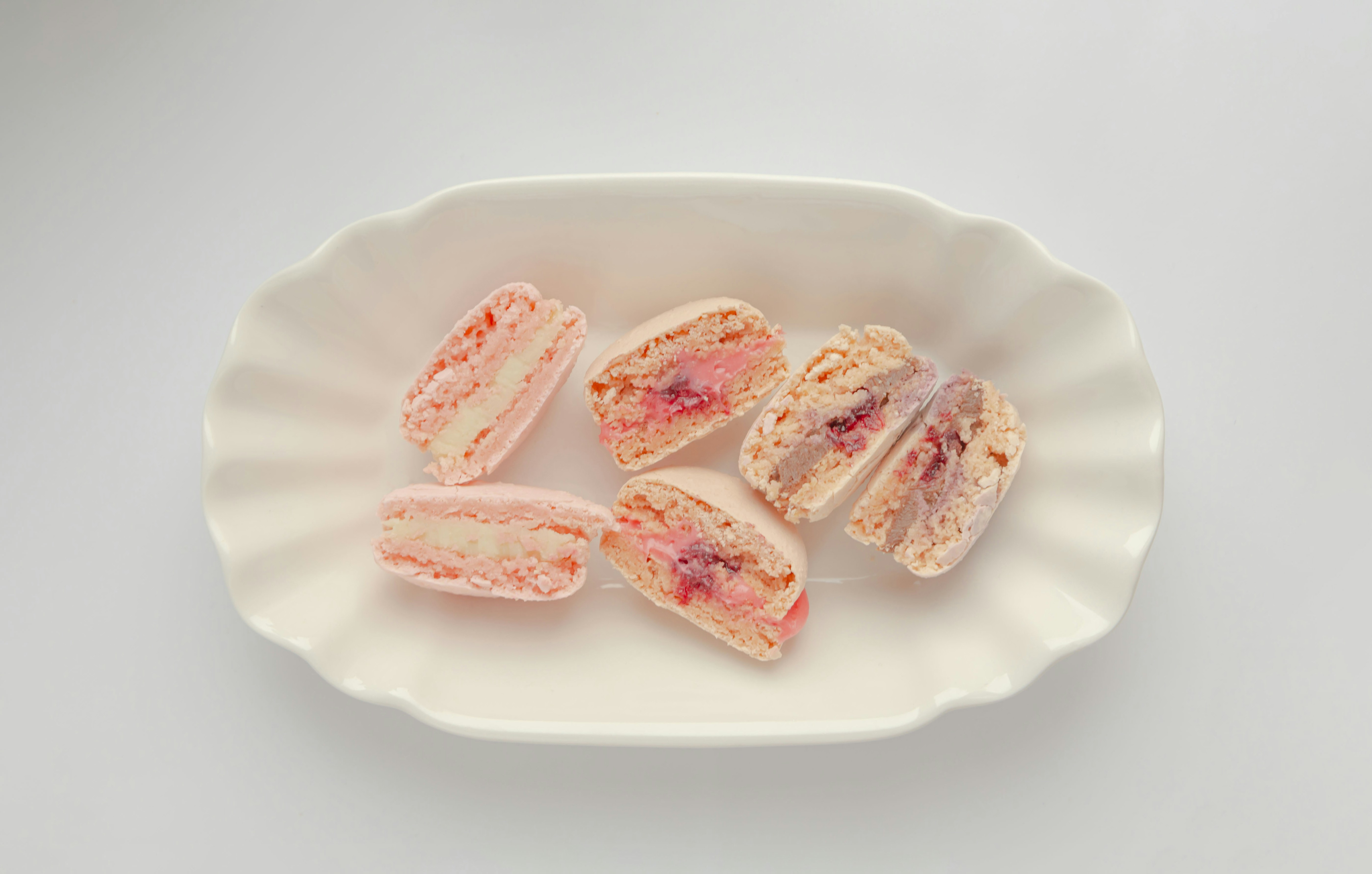 sliced sausage on white ceramic plate