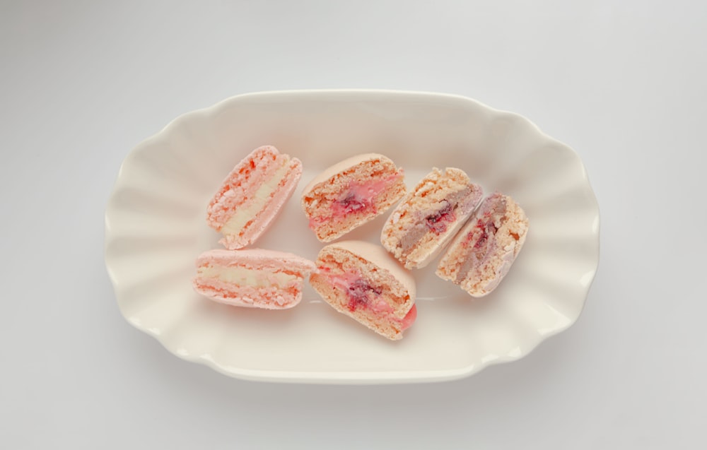 sliced sausage on white ceramic plate