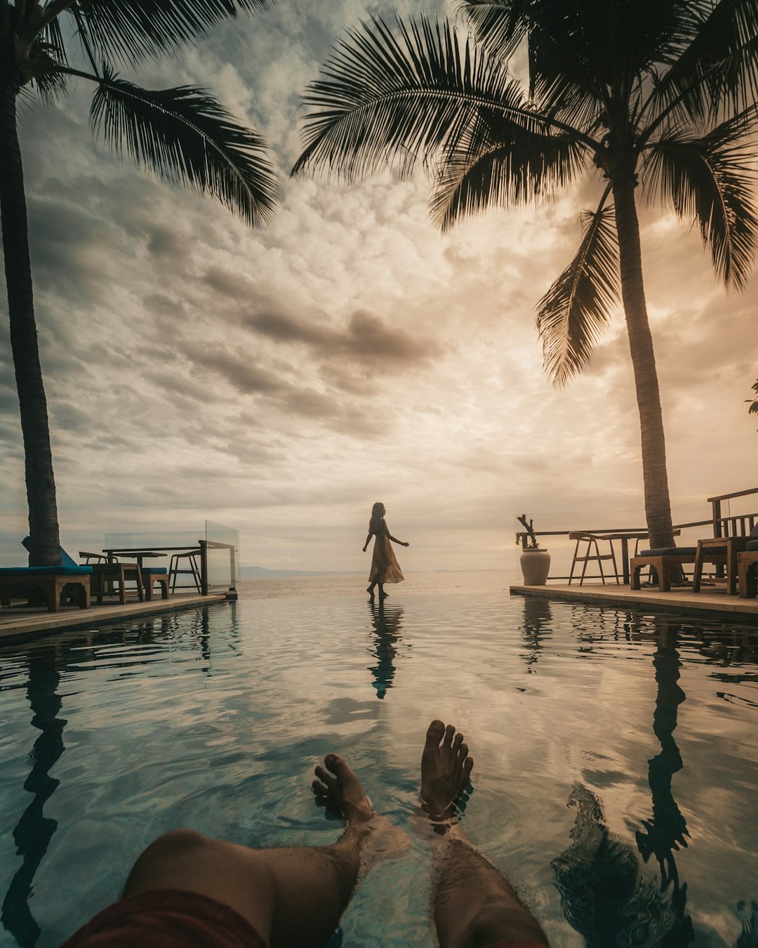 people in swimming pool during daytime