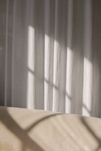 Soft natural light highlighting the texture of Jay Bothra Signature's refined linen pieces.