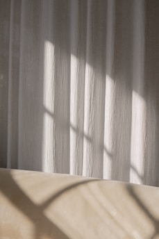 Soft natural light highlighting the texture of Jay Bothra Signature's refined linen pieces.