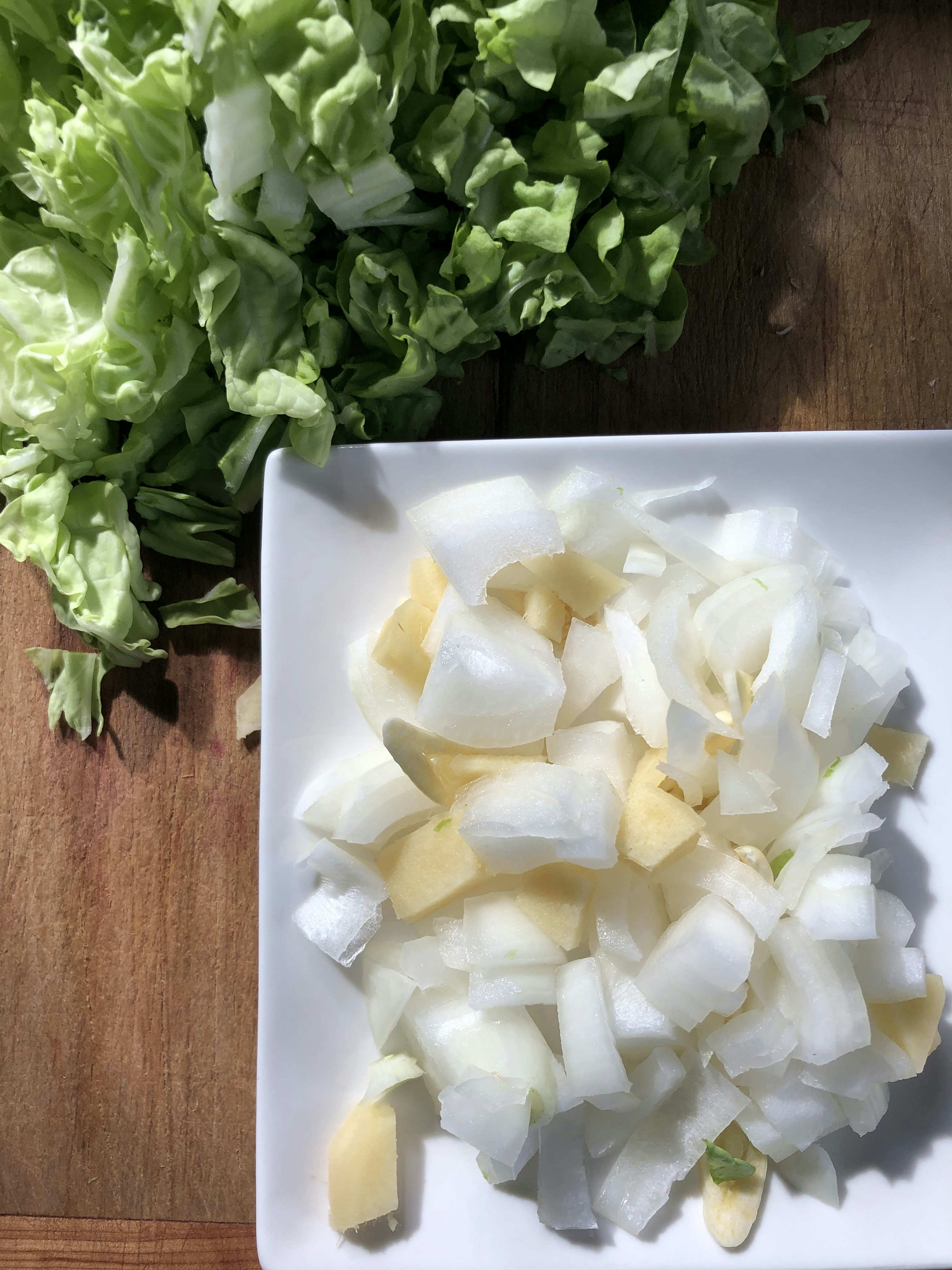 green vegetable on white ceramic plate
