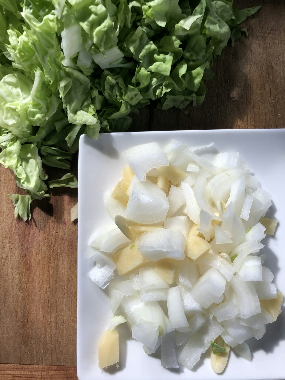 green vegetable on white ceramic plate