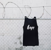 A model wearing a hoodie with a message of hope.