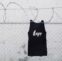 A model wearing a hoodie with a message of hope.