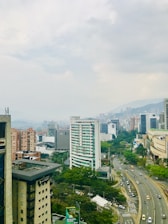 city buildings under white sky during daytime