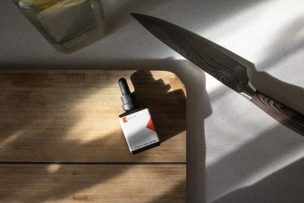 white box mod on brown wooden table