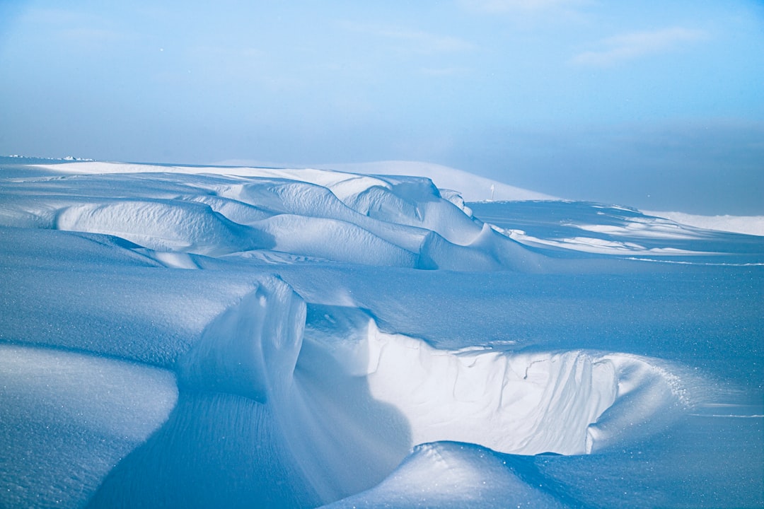 snow covered mountain during daytime