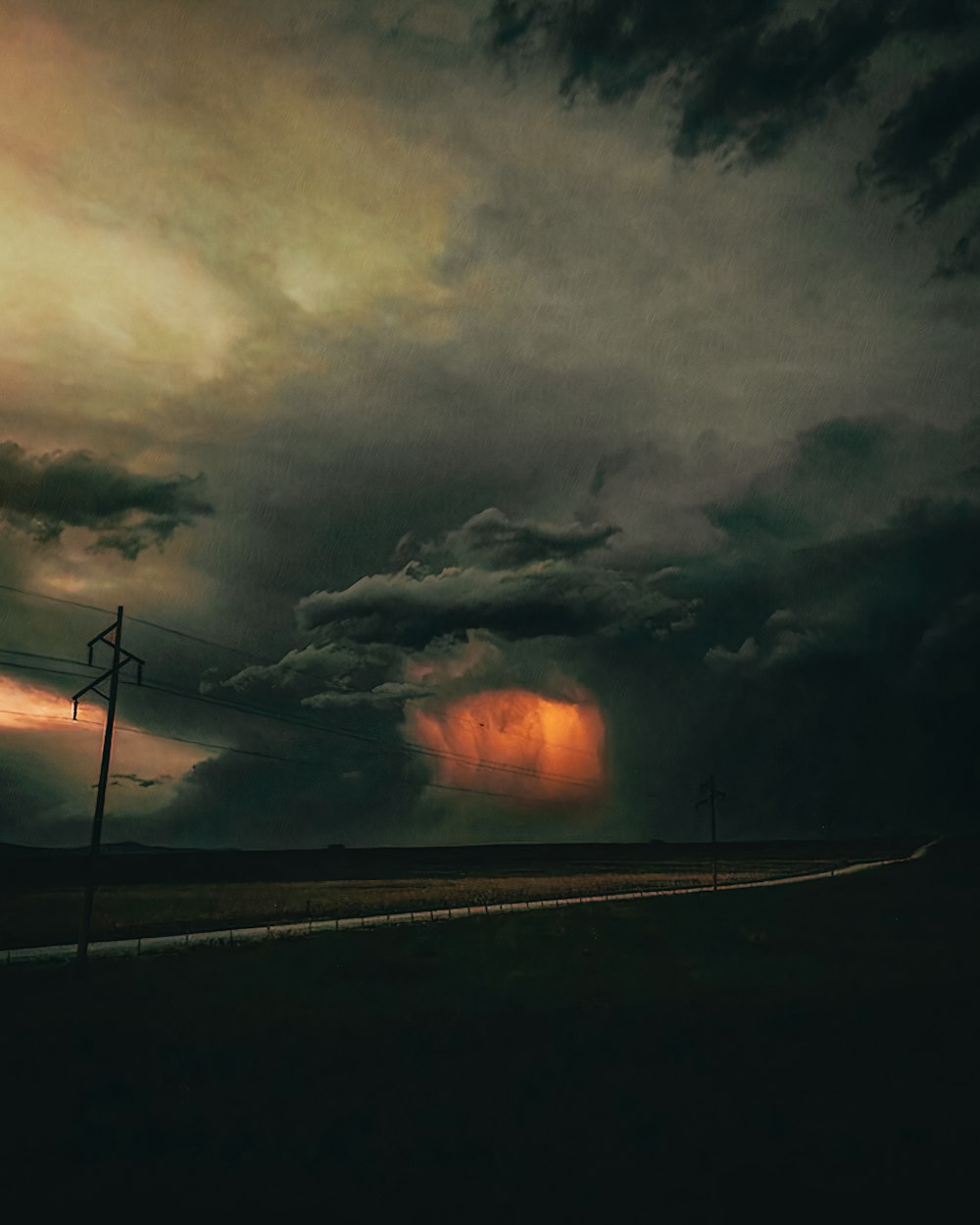 lightning strike on road during night time