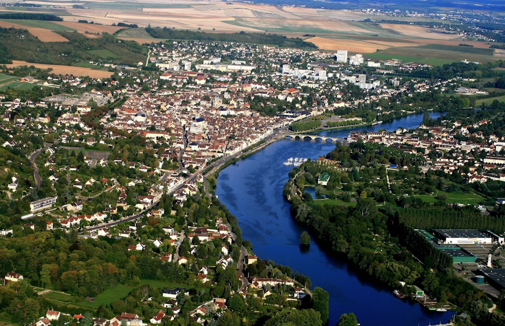 aerial view of city buildings and trees during daytime