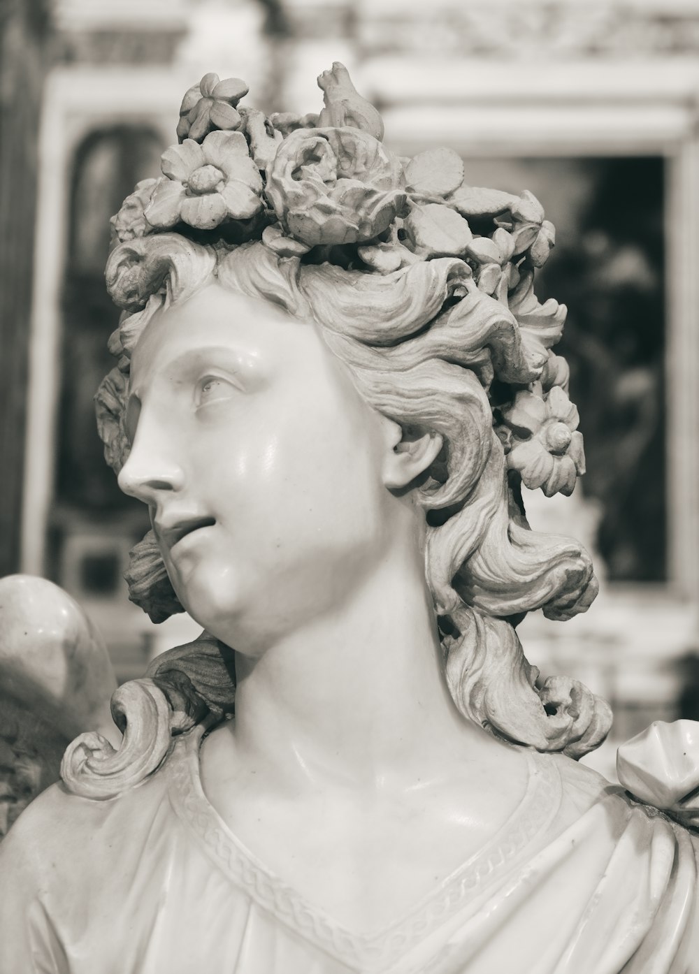 grayscale photo of woman statue