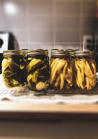 clear glass jar with yellow banana fruits