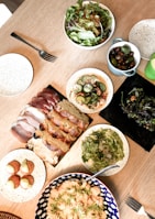 An assortment of traditional Argentine dishes on a wooden table.
