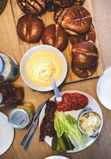 Modern kitchen setup with cooking utensils and ingredients ready for a burger-making class.