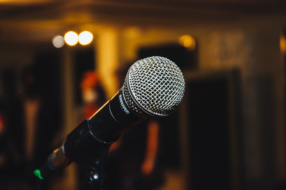 black microphone on black microphone stand